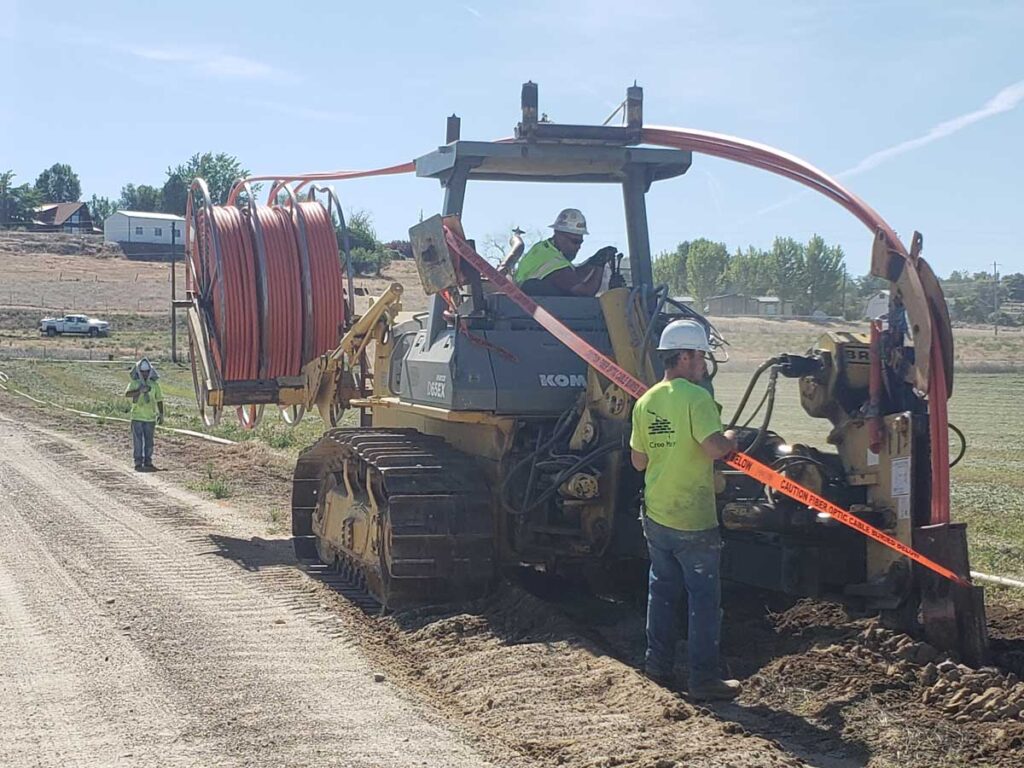 Farmers installing cable